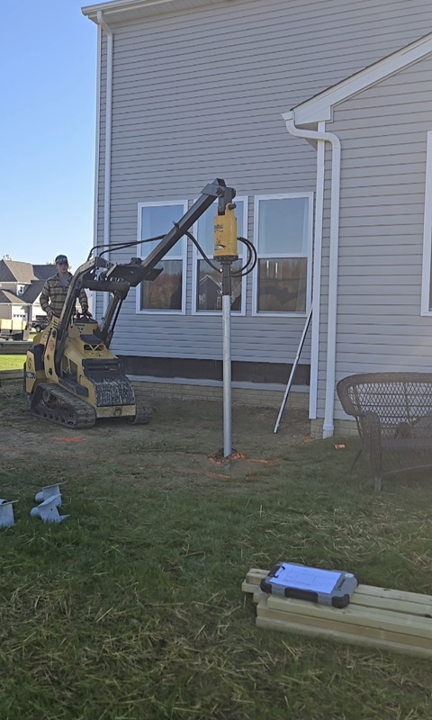 Red Sun Construction's custom composite deck design in Wadsworth backyard