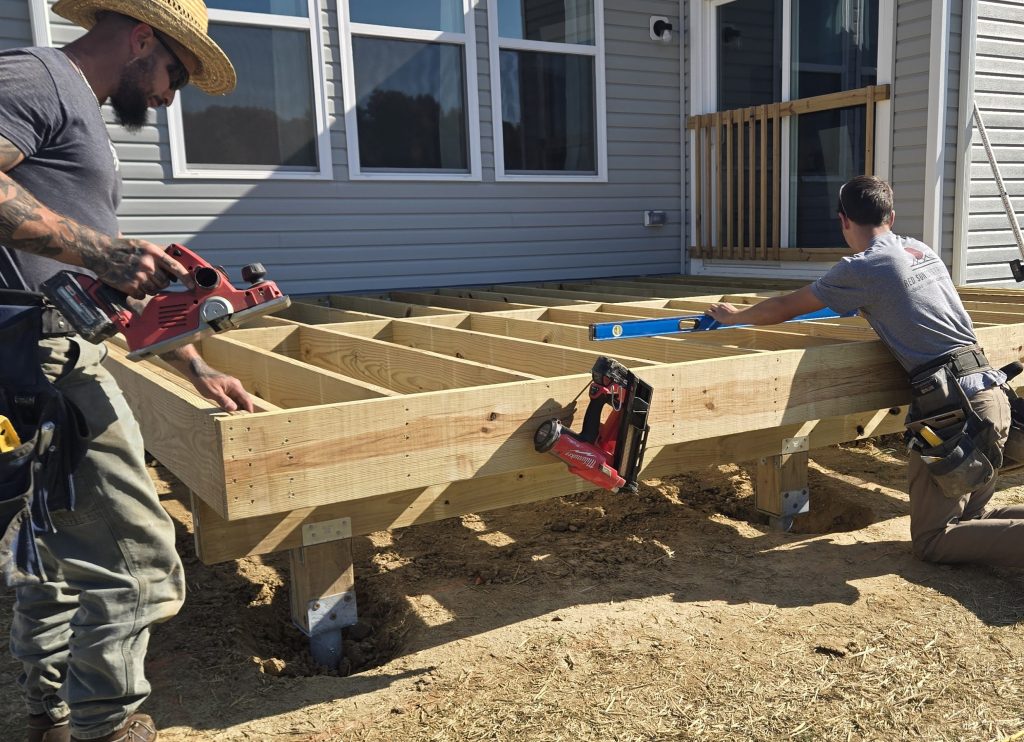 men building a deck